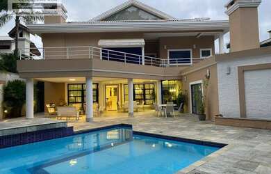 Imagem: A casa em condomínio possui 4 Dormitórios, 5 Banheiros, 5