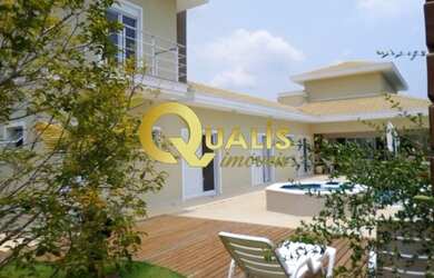 Imagem: A casa em condomínio possui 5 Dormitórios, 5 Banheiros, 4