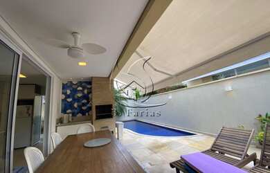 Imagem: A casa em condomínio possui 4 Dormitórios, 4 Banheiros, 2