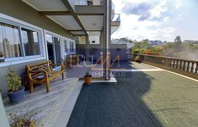 Imagem: A casa em condomínio possui 3 Dormitórios, 4 Banheiros, 4