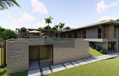 Imagem: A casa possui 5 Dormitórios, 4 Banheiros, 4 Vagas na garagem