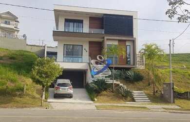 Imagem: A casa em condomínio possui 4 Dormitórios, 5 Banheiros, 4