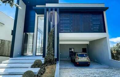 Imagem: A casa em condomínio possui 4 Dormitórios, 5 Banheiros, 4