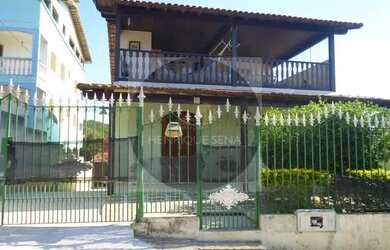 Imagem: A casa possui 3 Dormitórios, 3 Banheiros, 5 Vagas na garagem