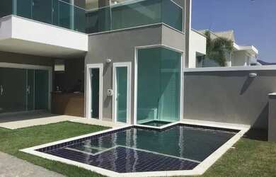 Imagem 2: Casa de condomínio para venda possui 410 metros quadrados com 4 quartos