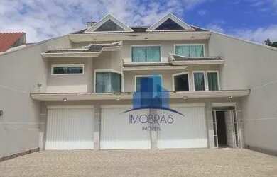 Imagem: A casa possui 5 Dormitórios, 5 Banheiros, 5 Vagas na garagem