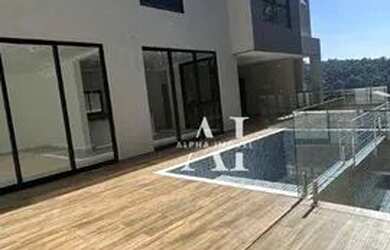 Imagem: A casa em condomínio possui 4 Dormitórios, 5 Banheiros, 2