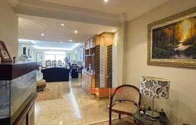 Imagem: O apartamento possui 4 Dormitórios, 5 Banheiros, 2 Vagas na