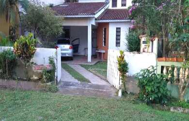 Imagem: A casa à venda possui 3 Dormitórios, 2 Banheiros, 2 Vagas
