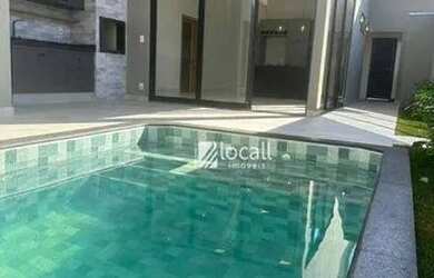 Imagem: A casa possui 3 Dormitórios, 4 Banheiros, 2 Vagas na garagem