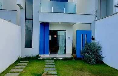 Imagem: A casa possui 2 Dormitórios, 3 Banheiros, 2 Vagas na garagem