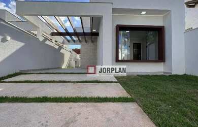 Imagem: A casa possui 3 Dormitórios, 2 Banheiros, 3 Vagas na garagem