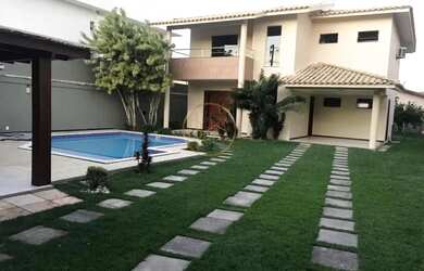 Imagem: A casa possui 3 Dormitórios, 4 Banheiros, 4 Vagas na garagem