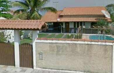 Imagem: A casa possui 2 Dormitórios, 3 Vagas na garagem e está localizado