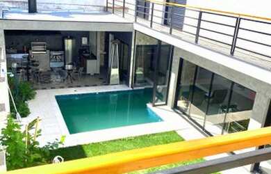 Imagem: A casa em condomínio possui 4 Dormitórios, 5 Banheiros, 4