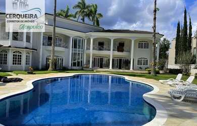 Imagem: A casa possui 5 Dormitórios, 5 Banheiros, 5 Vagas na garagem