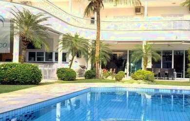 Imagem: A casa possui 5 Dormitórios, 5 Banheiros, 5 Vagas na garagem