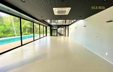 Imagem: A casa em condomínio à venda possui 5 Dormitórios, 5 Banheiros