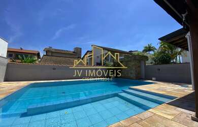 Imagem: A casa em condomínio possui 4 Dormitórios, 4 Banheiros, 3