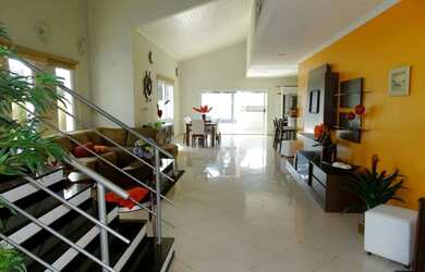 Imagem: A casa possui 5 Dormitórios, 5 Banheiros, 5 Vagas na garagem