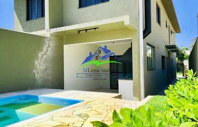 Imagem: A casa possui 3 Dormitórios, 3 Banheiros, 2 Vagas na garagem