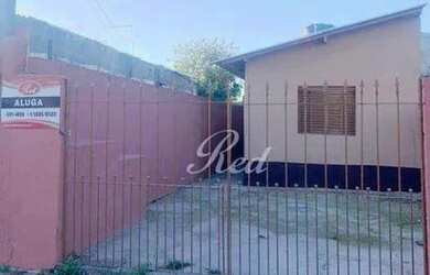 Imagem: A casa possui 2 Dormitórios, 1 Banheiro, 2 Vagas na garagem