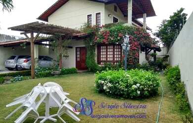 Imagem: A casa possui 5 Dormitórios, 5 Banheiros, 3 Vagas na garagem