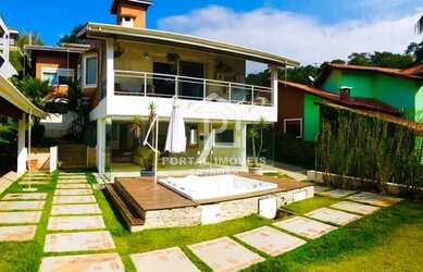 Imagem: A casa em condomínio possui 5 Dormitórios, 5 Banheiros, 5