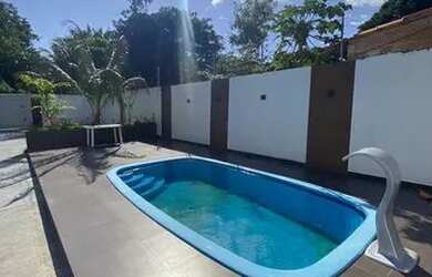 Imagem: A casa possui 5 Dormitórios, 3 Banheiros, 5 Vagas na garagem