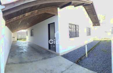 Imagem: A casa possui 3 Dormitórios, 1 Banheiro, 2 Vagas na garagem