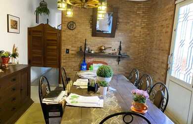 Imagem: A casa possui 3 Dormitórios, 4 Banheiros, 2 Vagas na garagem