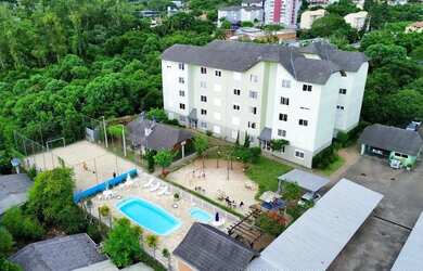 Imagem: O apartamento possui 2 Dormitórios, 1 Banheiro, 1 Vaga na garagem