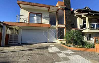 Imagem 1: Ampla Casa com 4 Dormitórios e Lareira à Venda ou para Alugar no Jardim Timbaúva, Gravataí