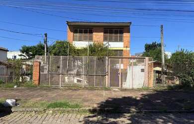 Imagem: A casa possui 2 Dormitórios, 4 Banheiros, 3 Vagas na garagem