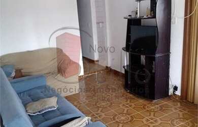 Imagem: A casa possui 3 Dormitórios, 2 Banheiros, 2 Vagas na garagem