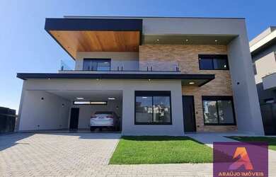 Imagem: A casa em condomínio possui 4 Dormitórios, 5 Banheiros, 3