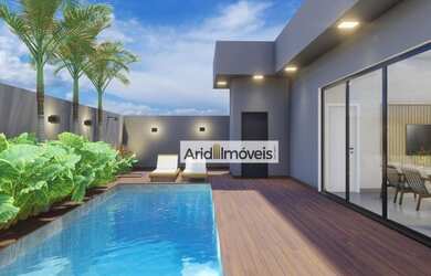 Imagem: A casa possui 3 Dormitórios, 5 Banheiros, 4 Vagas na garagem