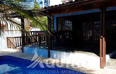 Imagem: A casa possui 3 Dormitórios, 4 Banheiros, 5 Vagas na garagem