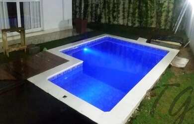 Imagem: A casa em condomínio possui 4 Dormitórios, 5 Banheiros, 2