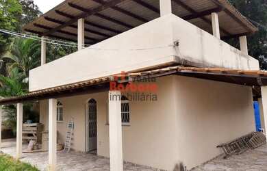 Imagem: A casa possui 2 Dormitórios, 1 Banheiro, 1 Vaga na garagem