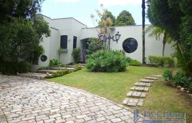 Imagem: A casa possui 5 Dormitórios, 5 Banheiros, 5 Vagas na garagem