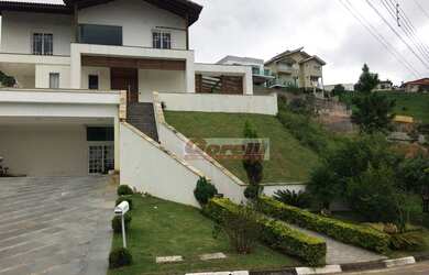 Imagem: A casa em condomínio possui 5 Dormitórios, 5 Banheiros, 1