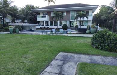 Imagem: A casa possui 5 Dormitórios, 5 Banheiros, 5 Vagas na garagem