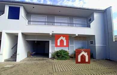 Imagem: A casa possui 2 Dormitórios, 1 Banheiro, 1 Vaga na garagem