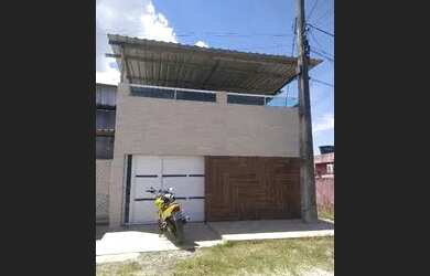 Imagem: A casa possui 2 Dormitórios, 1 Banheiro, 1 Vaga na garagem