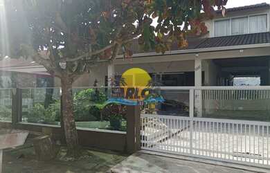 Imagem: A casa possui 5 Dormitórios, 3 Banheiros, 3 Vagas na garagem