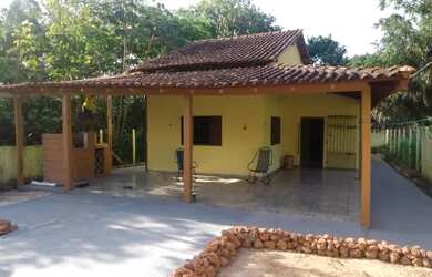 Imagem: A casa possui 3 Dormitórios, 3 Banheiros, 2 Vagas na garagem