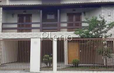 Imagem: A casa possui 3 Dormitórios, 3 Banheiros, 4 Vagas na garagem