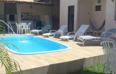 Imagem: A casa possui 3 Dormitórios, 5 Vagas na garagem e está localizado