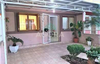 Imagem: A casa possui 2 Dormitórios, 1 Banheiro, 2 Vagas na garagem